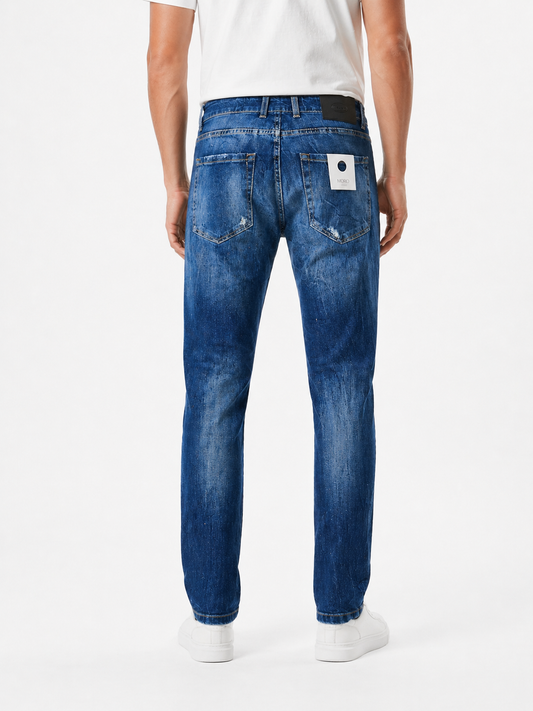 Jeans uomo slim fit denim elasticizzato – vista posteriore con sabbiatura – Made in Italy Frarò