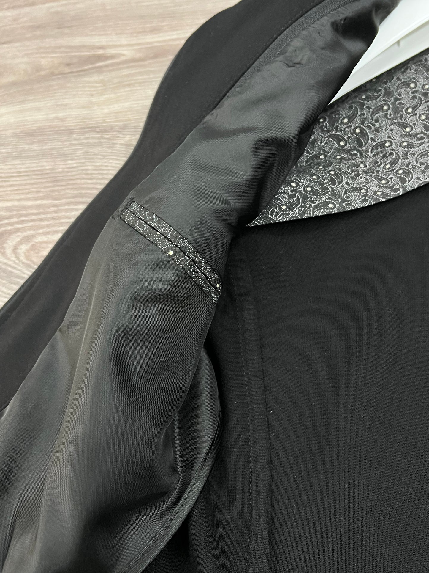 Dettaglio tasche giacca punto milano uomo