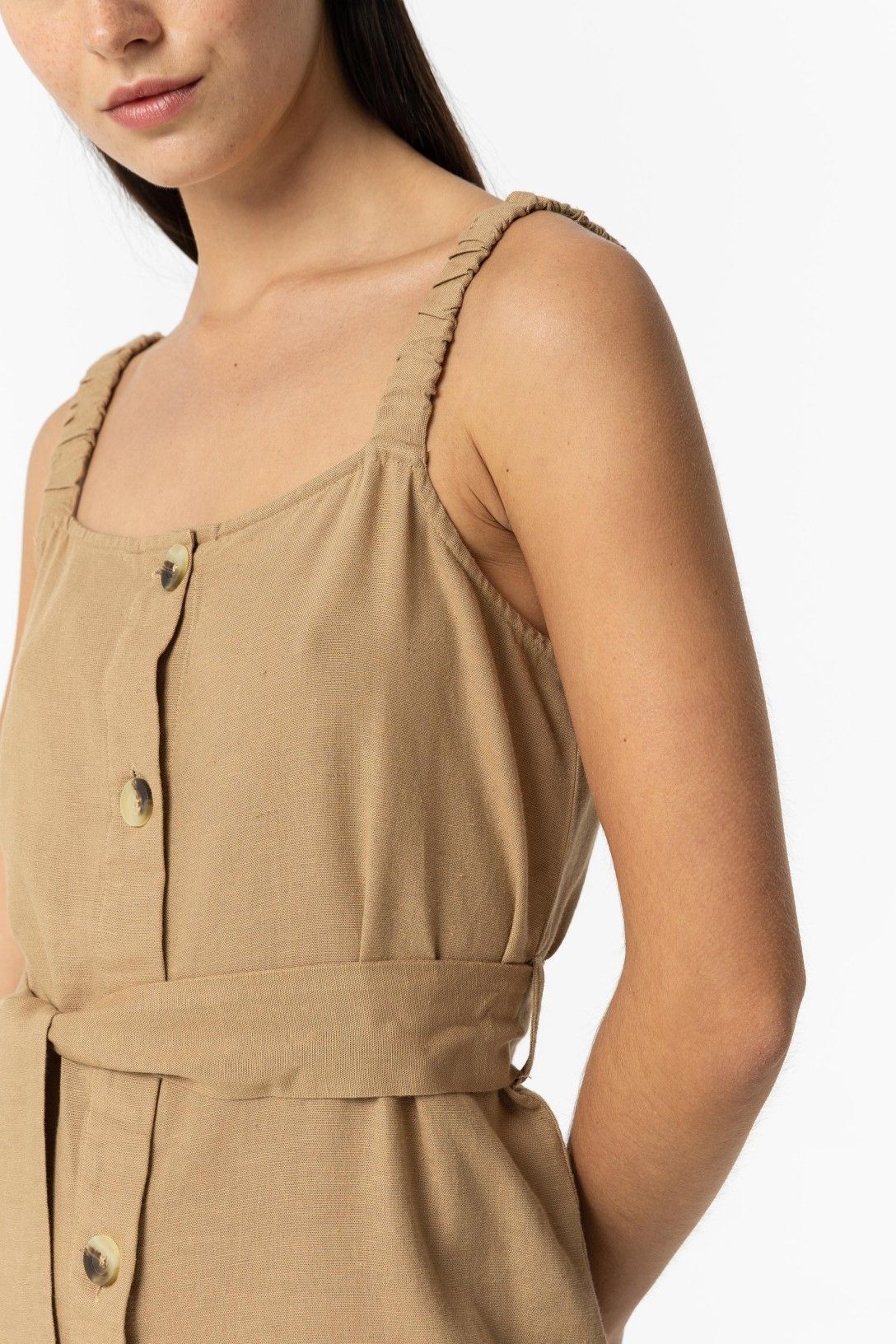 "Dettaglio texture abito Crack verde beige - qualità tessuto"