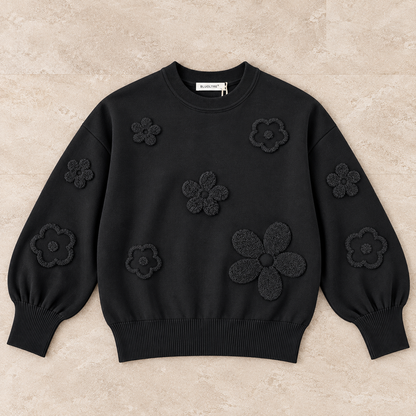 Maglia donna 622 Bluoltre nera con fiori tono su tono in rilievo, vista frontale del capo steso
