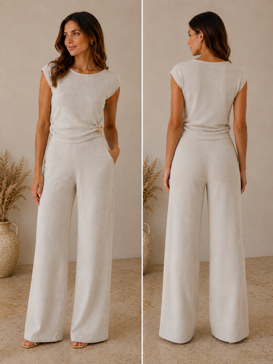 Modella indossa coord set donna elegante Taky di Frarò: completo due pezzi elegante per l'estate, disponibile in taglie XS-XL