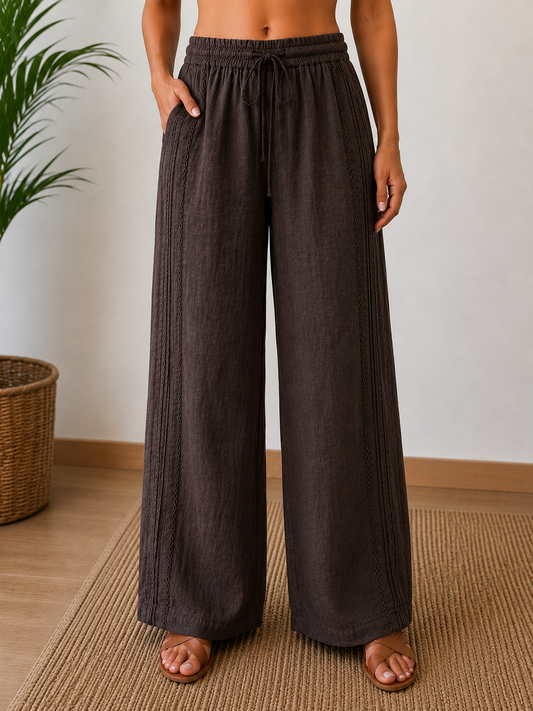 Pantalone palazzo in lino cioccolato - gamba larga alta vita - vista frontale indossato da modella - Made in Italy - Frarò