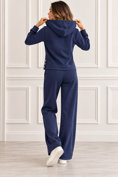 Tuta donna Olivia blu Tiffosi vista posteriore, con felpa con cappuccio e pantalone palazzo