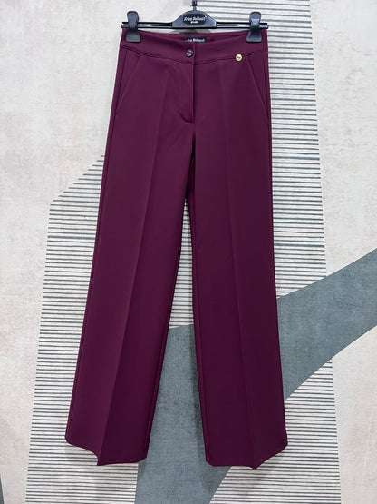 Pantalone palazzo bordeaux Erica Bellucci a vita alta con gamba ampia e chiusura frontale