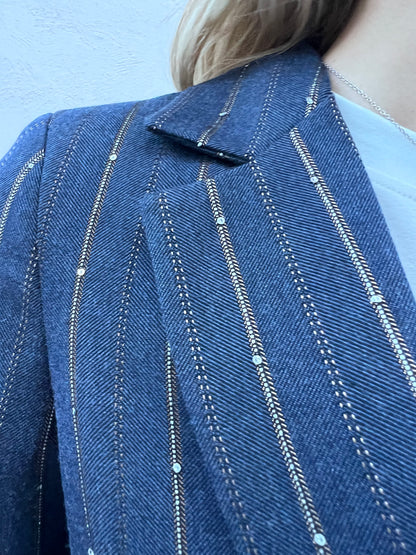 Dettaglio tessuto spigato effetto lana con brillantini - tailleur made in Italy