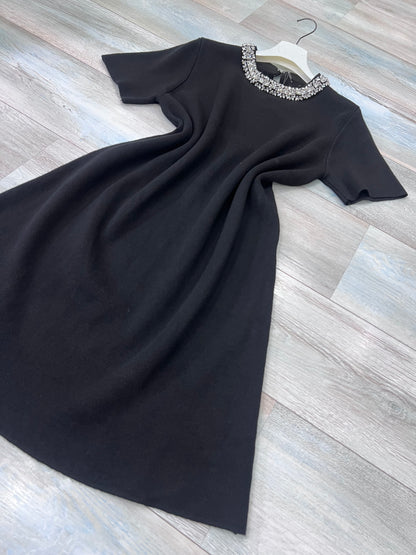 Dettaglio tessuto lanetta premium abito donna - 50% viscosa 28% poliestere
