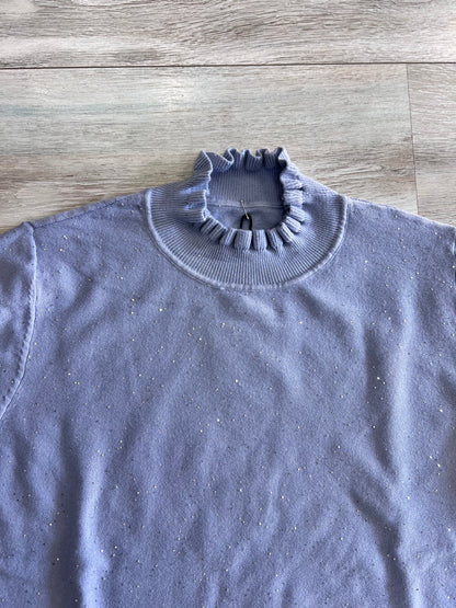 "Dettaglio mezzo collo maglia lurex - design versatile ed elegante"