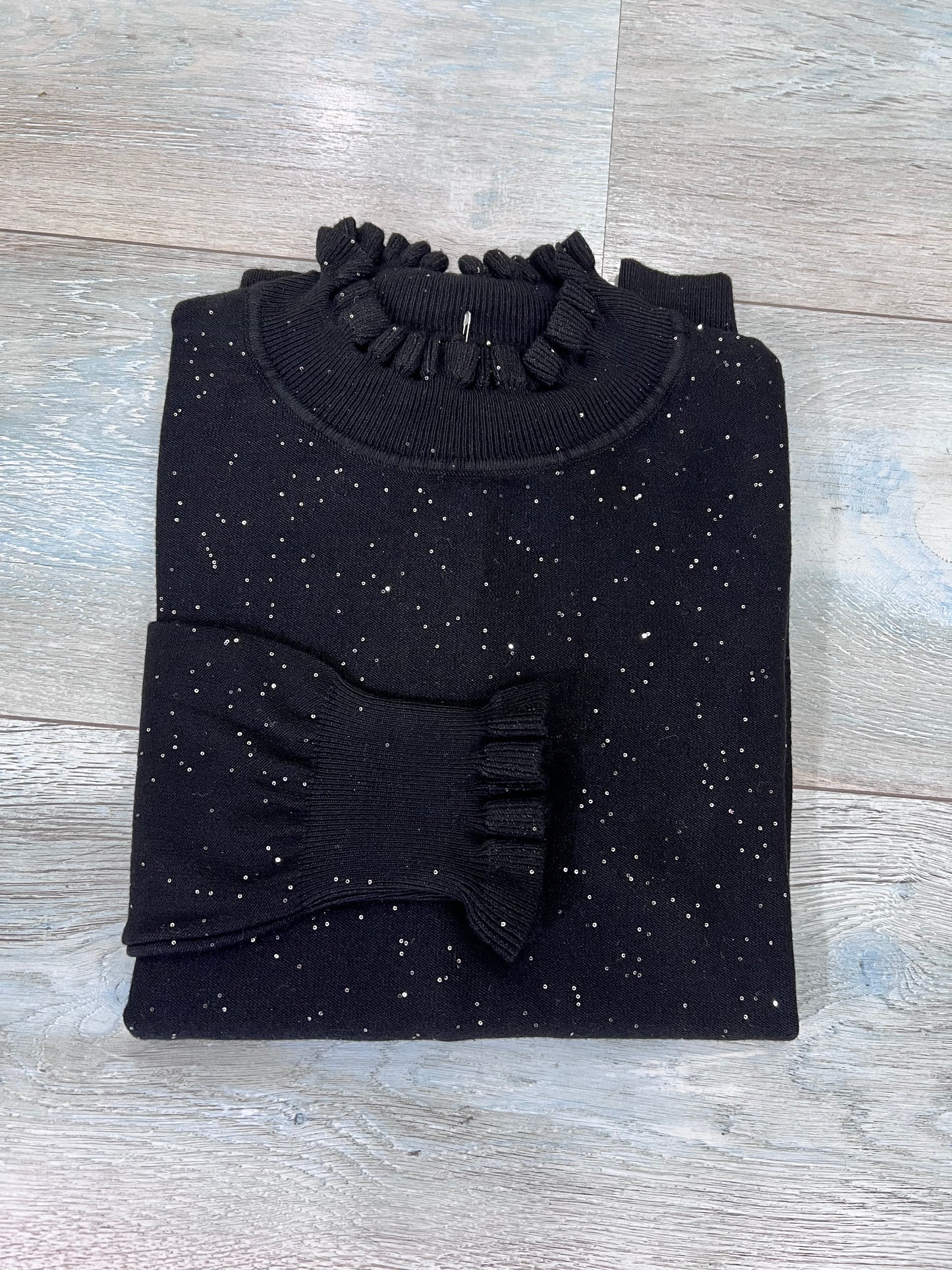 "Maglia donna lurex nera con mezzo collo - versatile e elegante"