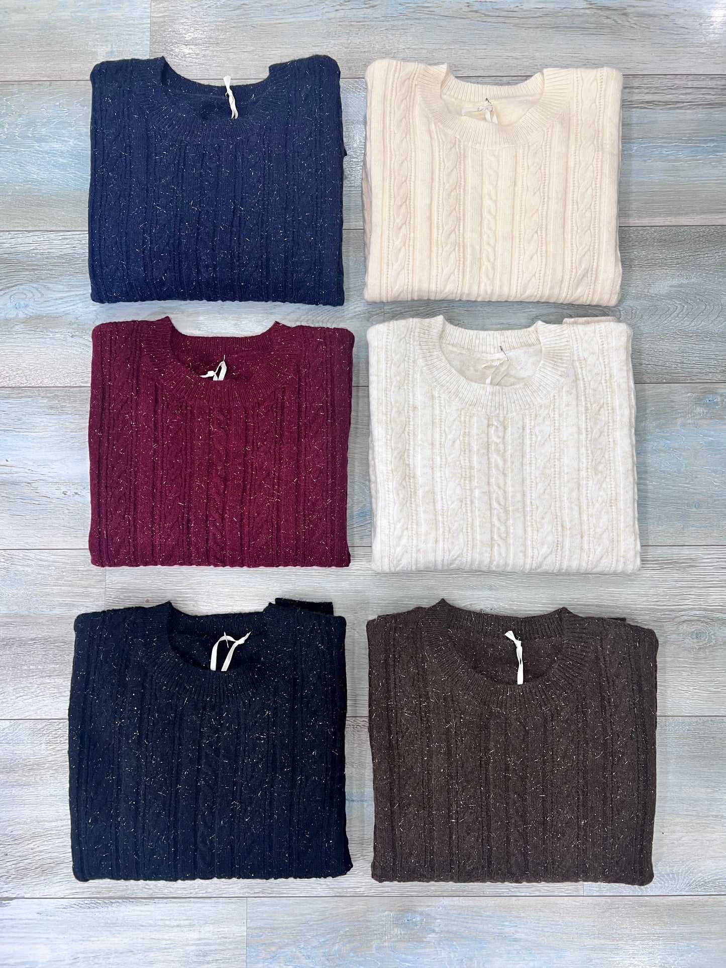 Close-up tessuto lurex e brillantini maglione donna - qualità premium
