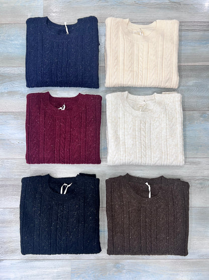 Close-up tessuto lurex e brillantini maglione donna - qualità premium
