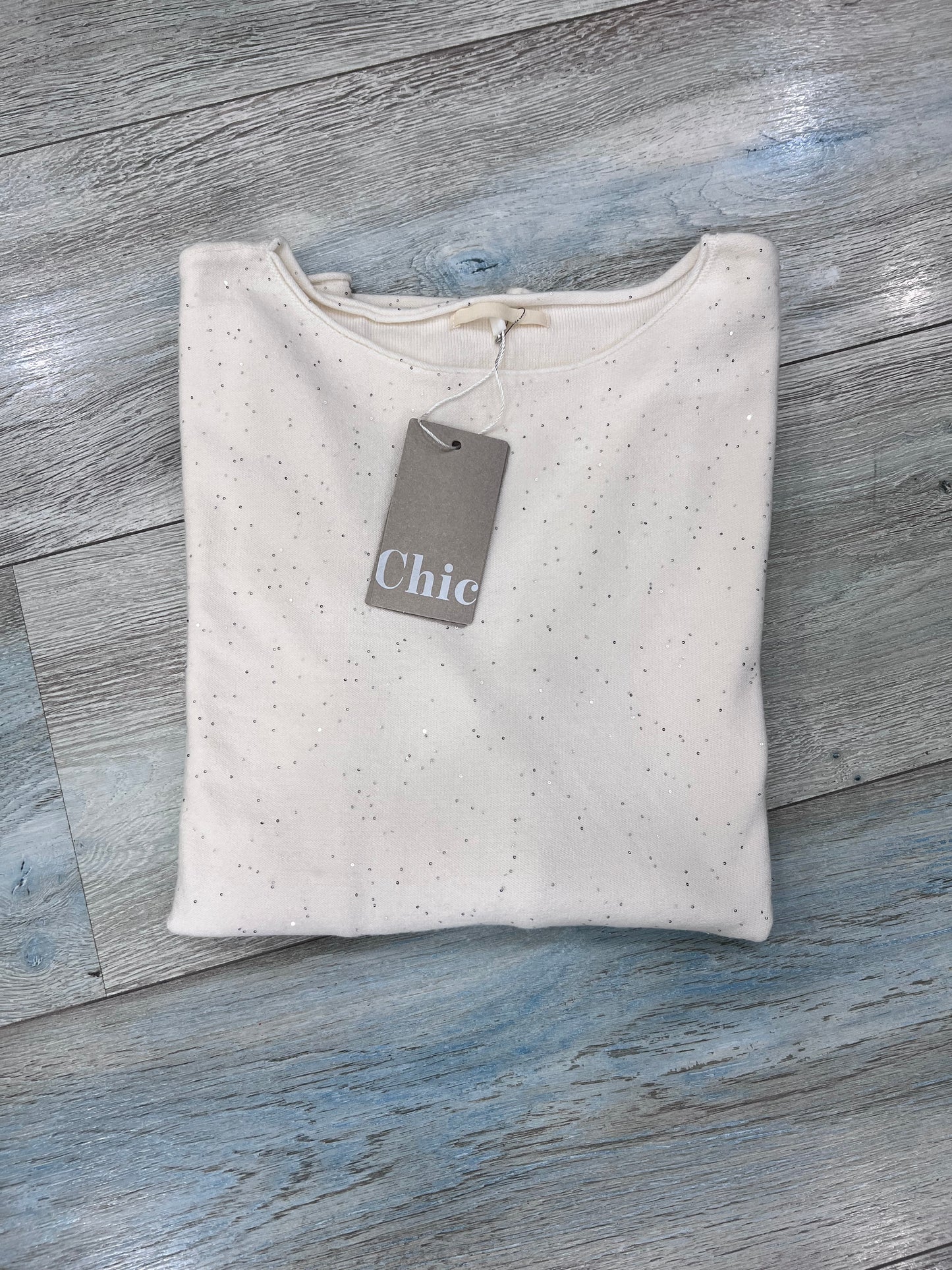 Maglia donna lurex - dettaglio tessuto con brillantini e texture premium