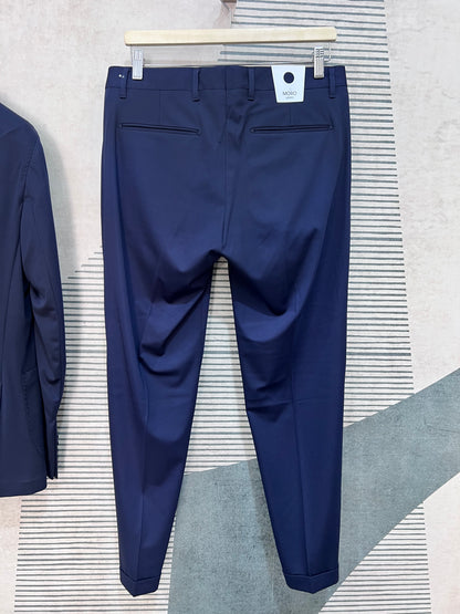 Pantalone abito uomo sartoriale punto milano blu navy — vista posteriore con tasche a filetto e risvolto al fondo, Made in Italy