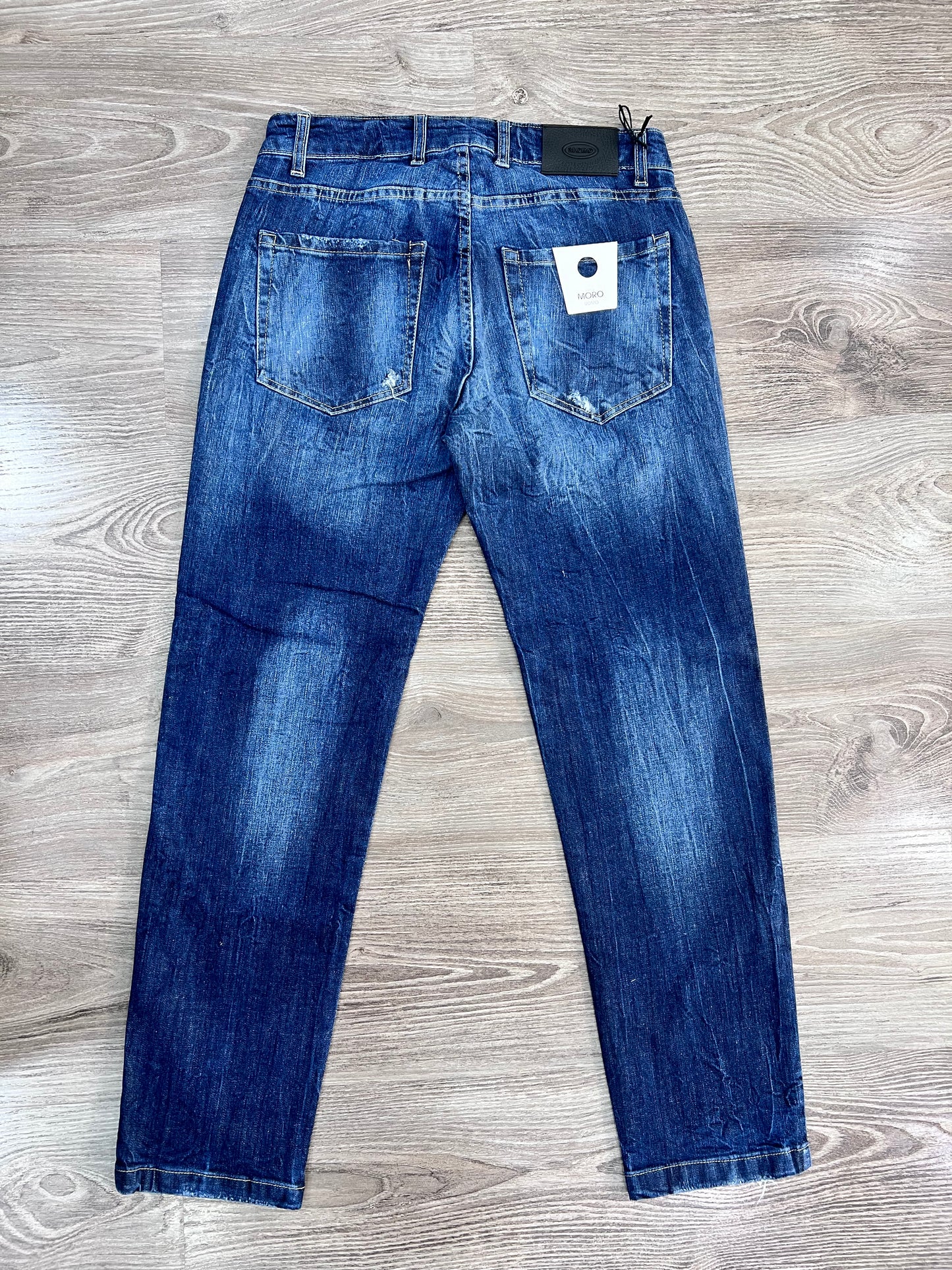Jeans uomo slim fit 5 tasche con rotture – dettaglio jeans non indossato posteriore – denim 98% cotone Frarò