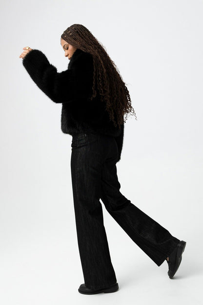 Jeans donna Tiffosi Bonnye_57 nero lucido vista laterale - gamba larga trendy"
