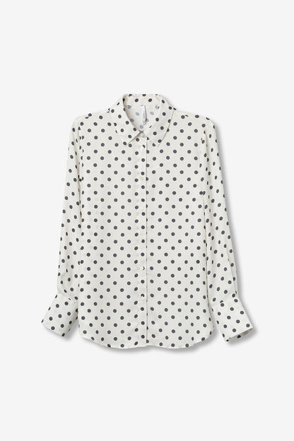 Camicia Paradise_3 appesa - vista del prodotto senza modella che mostra chiaramente la stampa a pois e la forma della camicia