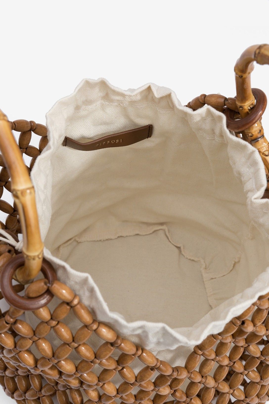 Borsa Sweeney legno naturale — dettaglio texture e finitura | Frarò

