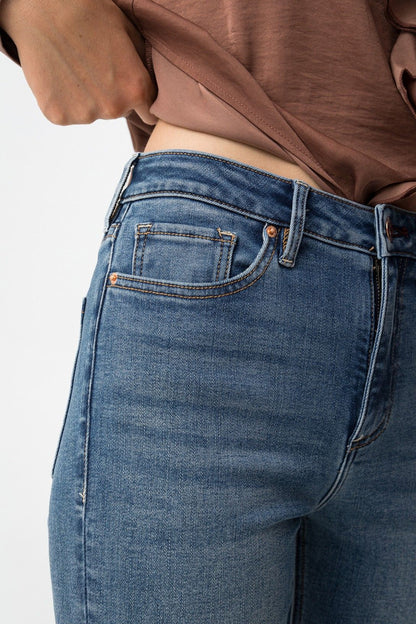 "Jeans zampa invernali Zoe_67 - apertura frontale con cerniera e bottone metallo"